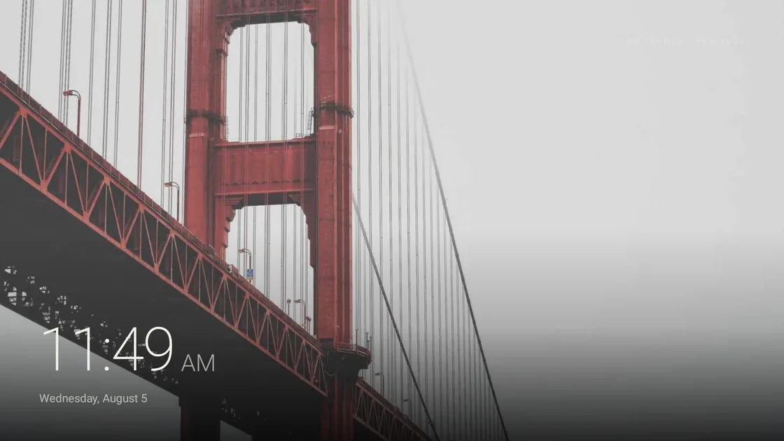 PhotoWall ambient screensaver showing the time over a photograph